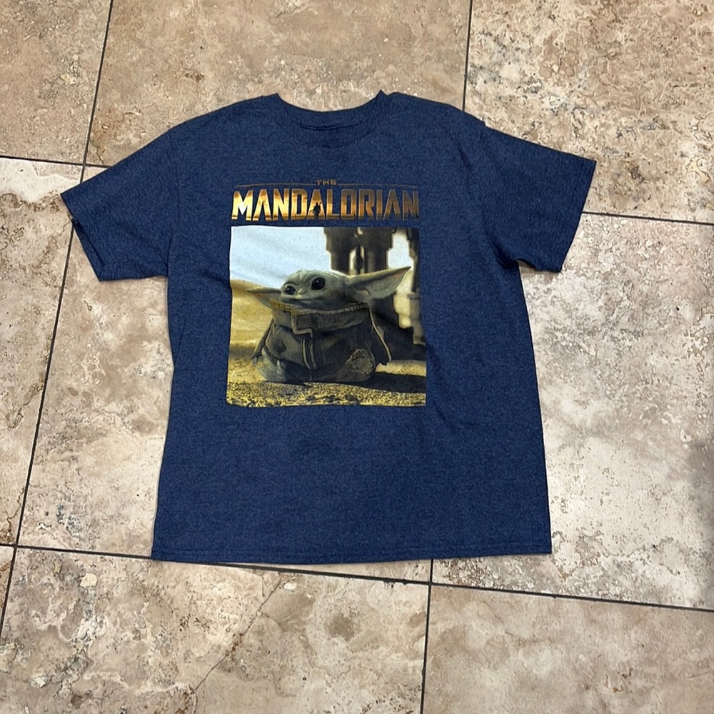 Grey mandolorian kids tee.